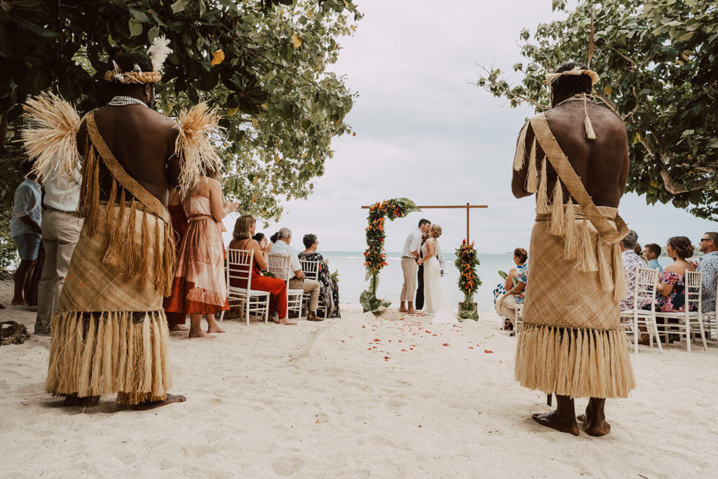 Couple kissing at the end of wedding ceremony on Erakor Island